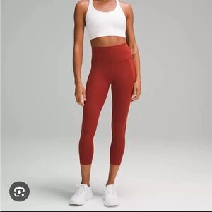 Lululemon Wunder Train High-Rise Tight with Pockets 25" inseam size 10 Orange